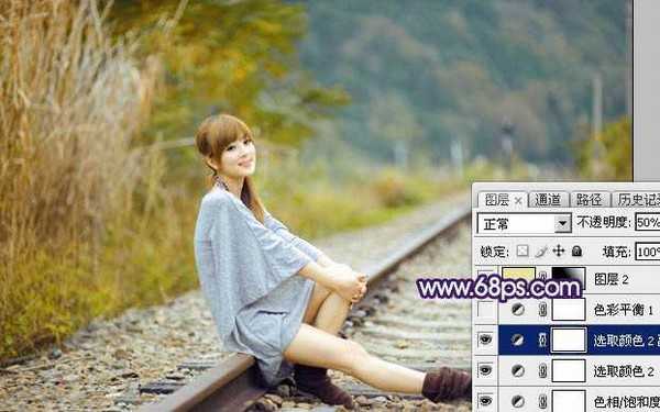 Photoshop调制出淡黄色的秋季铁轨小清新美女图片